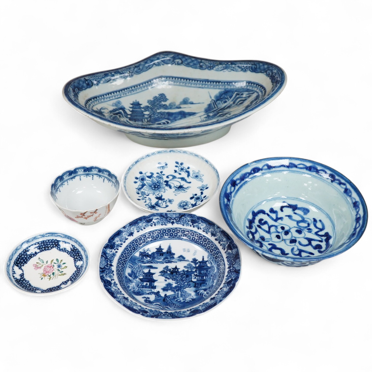 A group of 18th/19th century Chinese blue and white porcelain tea and dinner wares and an unusual Chinese soft paste porcelain famille rose saucer dish